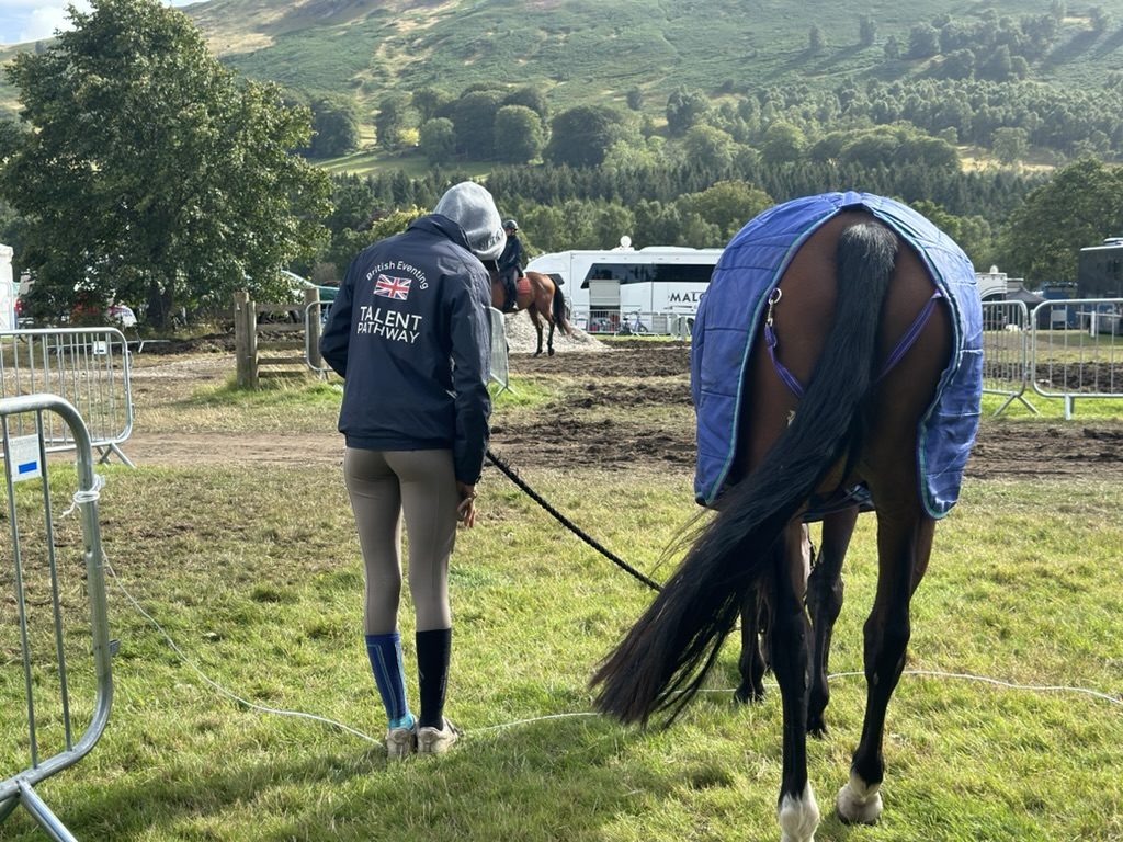 Leading Beanie back to the lorry in the Talent Pathway jacket