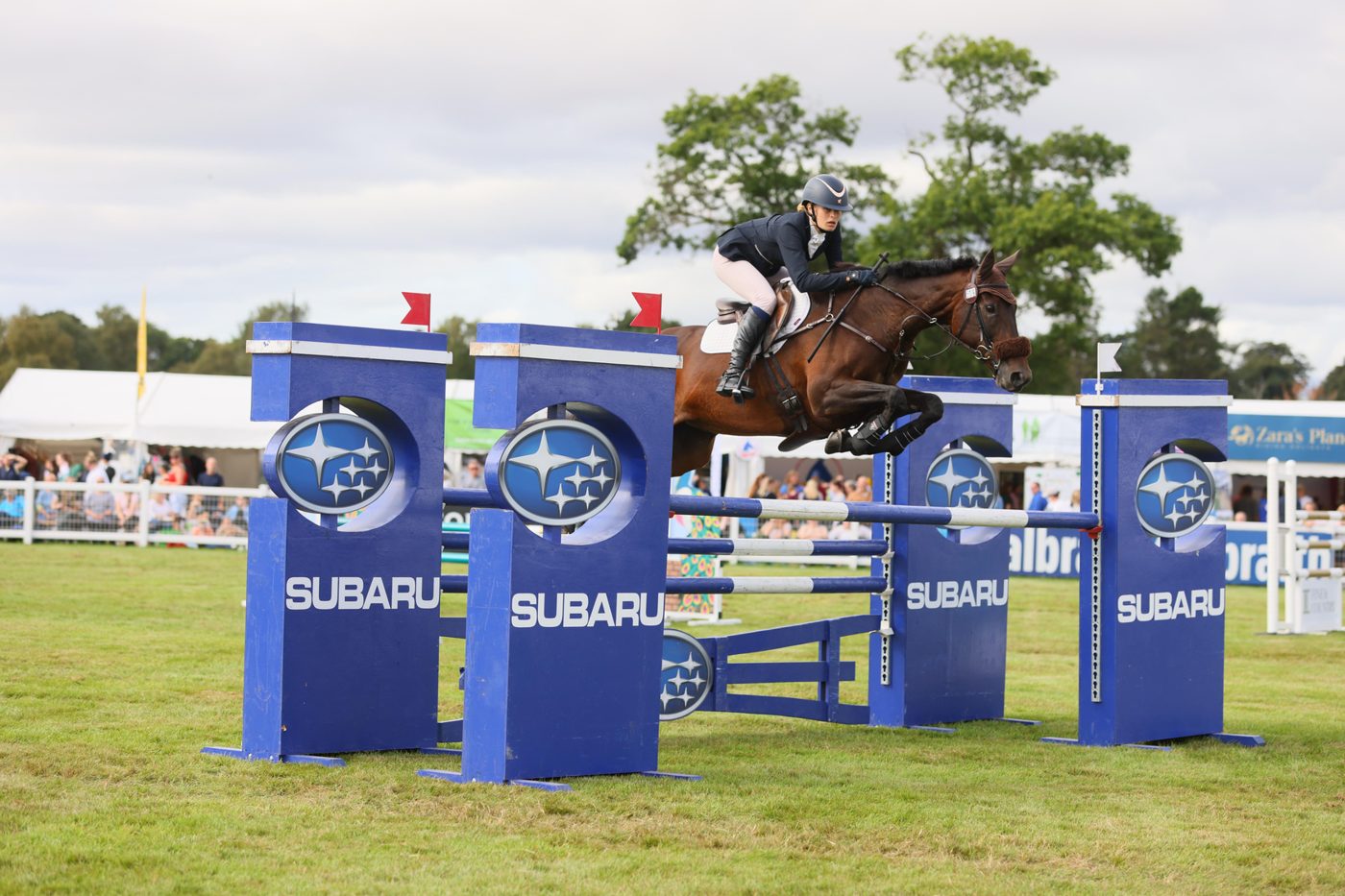Josie Summers showjumping at a four-star event